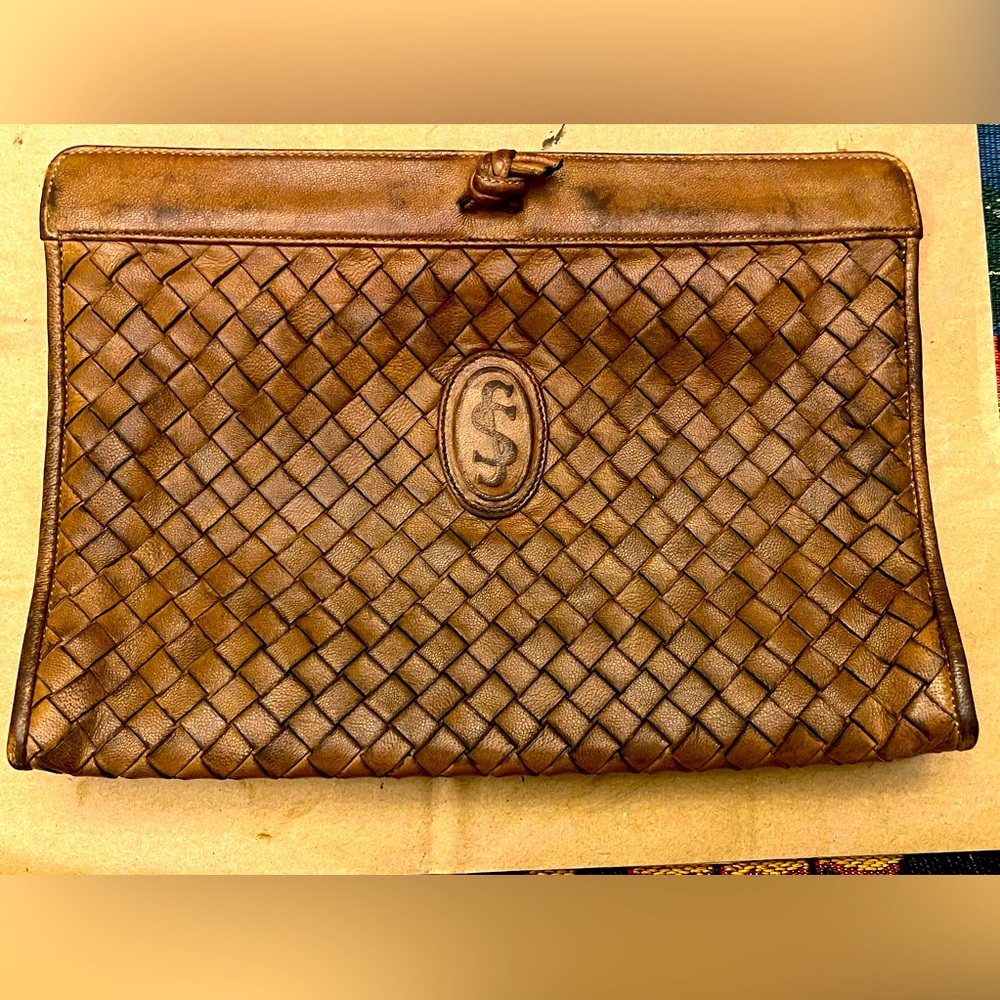 Bundle 4 w/ 😇 symbol for 20% promo Vintage Leather woven clutch  10’x7’in